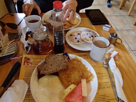 table full of breakfast plates
