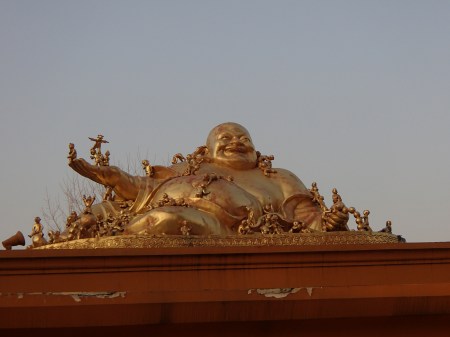 fat golden Buddha statue