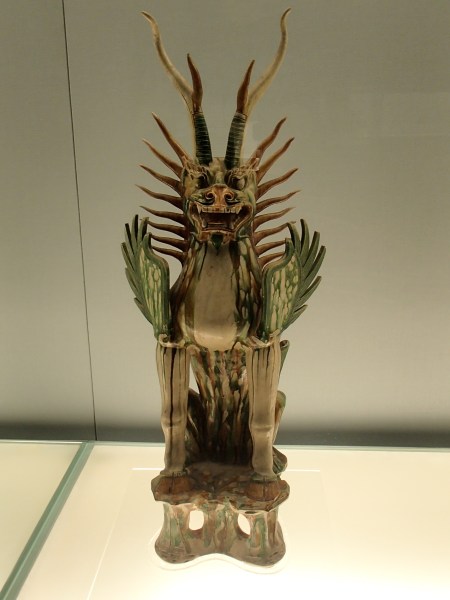 dragon like ceramic statue