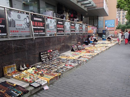 jewelry laid out on the sidewalk
