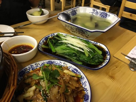 vegetable soup, cooked greens, spicy pork dish