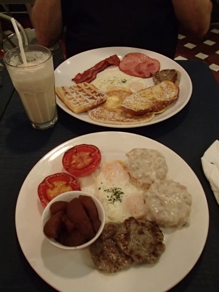 two plates of breakfast food