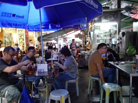 makeshift restaurant in an alleyway