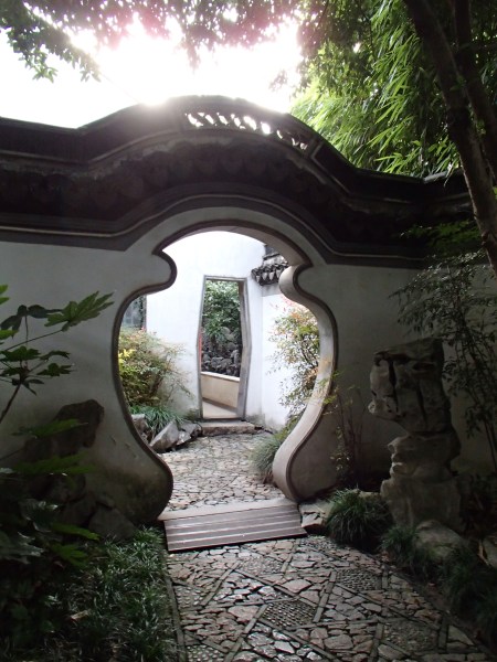 Chinese garden wall with vase shaped doorway