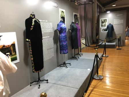 four Chinese qipao dresses on display