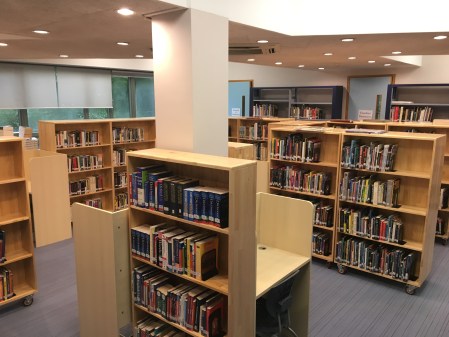 library wooden shelves arranged