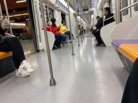 six people on a subway car