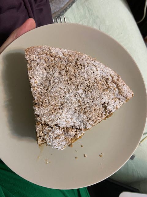 a plate containing a large piece of pie