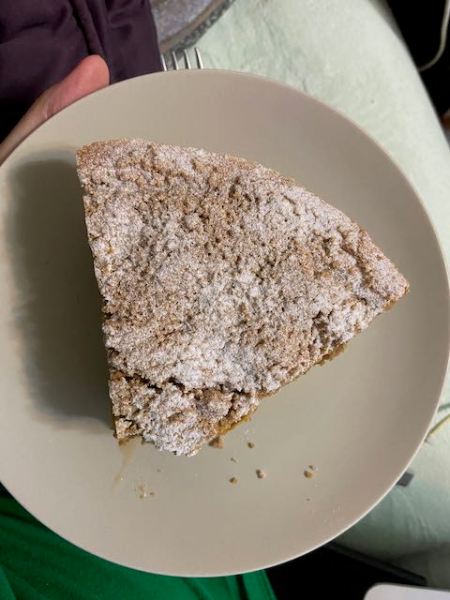 a plate containing a large piece of pie