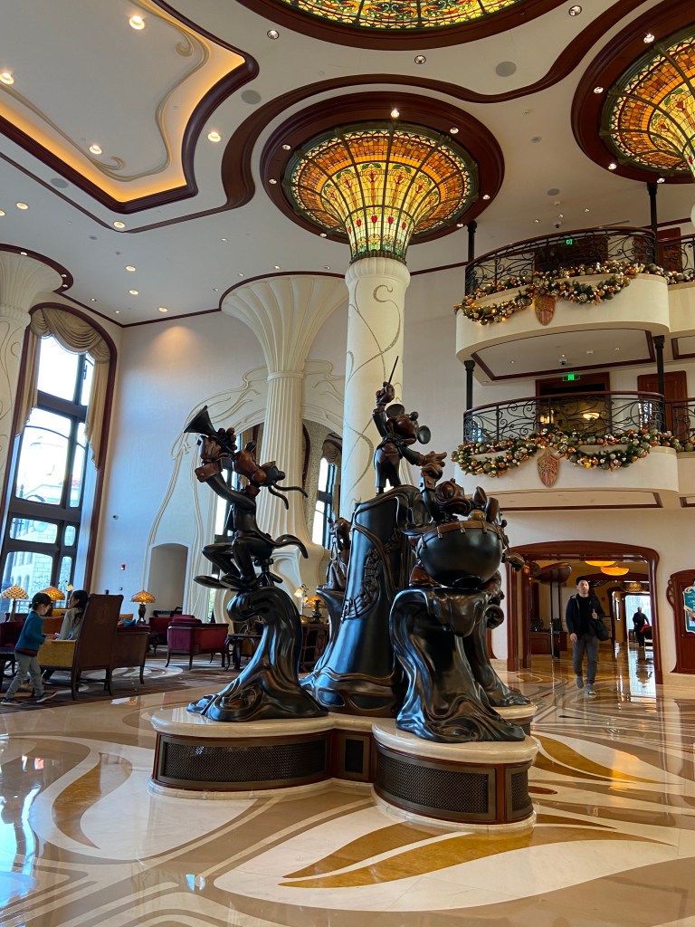 Statue of Disney characters in the lobby of the Shanghai Disneyland Hotel